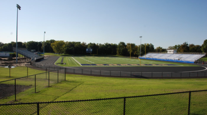 A wide angle photo of the track and field at St. John's Jesuit High School & Academy completed by the commercial construction team at Miller Diversfied