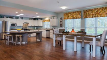 A kitchen with a table and chairs from a supported living home for Sunshine Inc. of Northwest Ohio, constructed by Miller Diversified