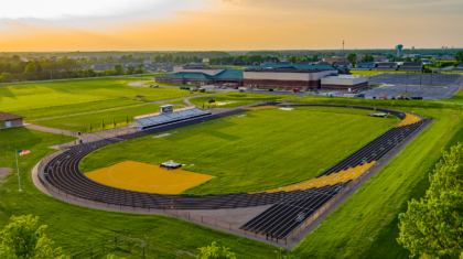 A sunset aerial view of the Perrysburg High School Track Commercial Construction Project